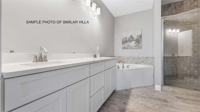 bathroom featuring vanity and plus walk in shower