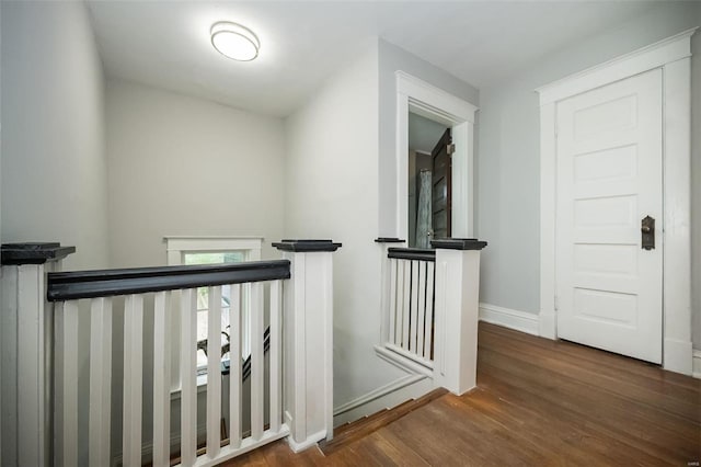 hallway featuring hardwood / wood-style flooring