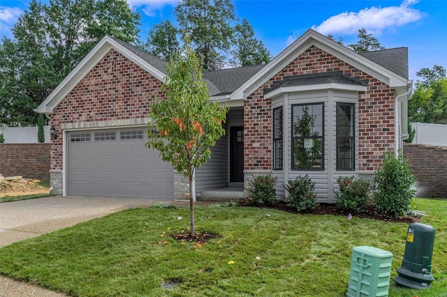 view of front facade with a front lawn and a garage