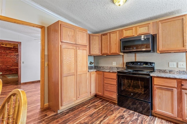 kitchen with ornamental molding, dark hardwood / wood-style floors, black range with electric cooktop, light brown cabinets, and a textured ceiling