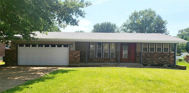 single story home featuring a front yard and a garage