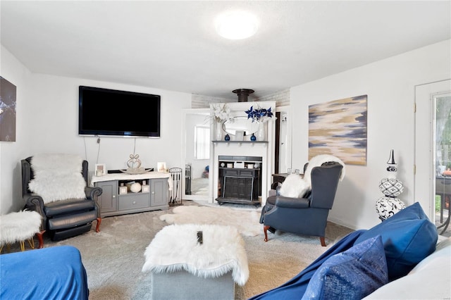 living room with light carpet and an inviting chandelier