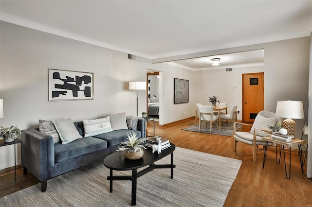 living room with hardwood / wood-style flooring