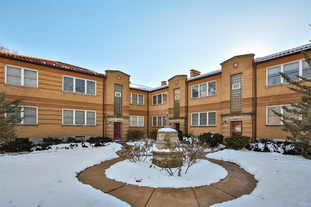 view of snow covered property