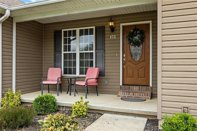 entrance to property with a porch