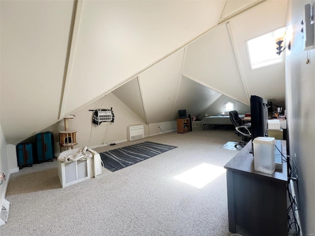 additional living space featuring carpet and vaulted ceiling