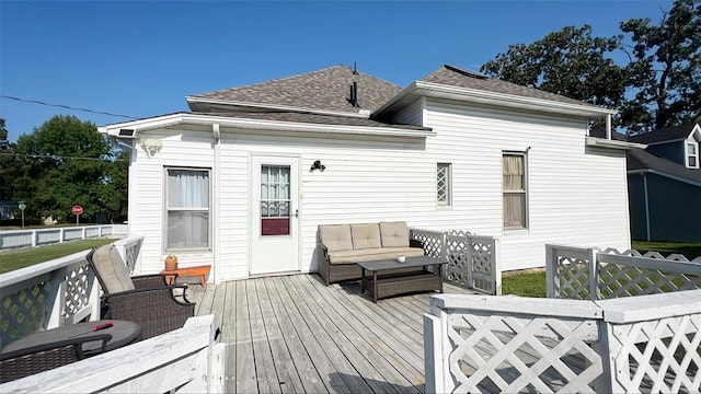 back of house featuring an outdoor hangout area and a wooden deck