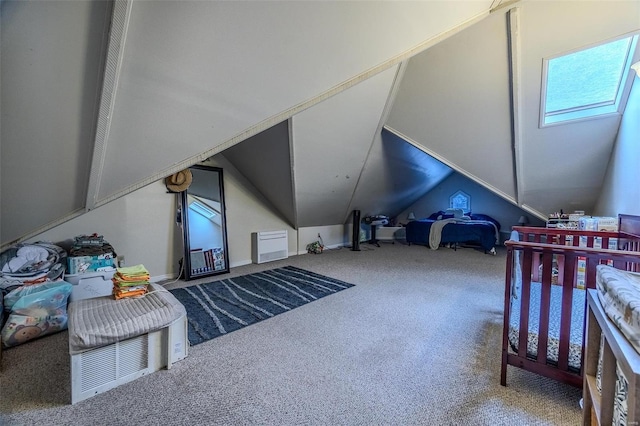 carpeted bedroom with lofted ceiling