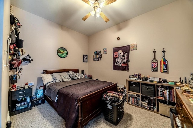 bedroom featuring light carpet and ceiling fan