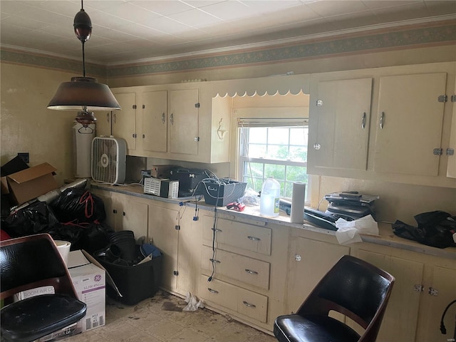 kitchen with crown molding and hanging light fixtures