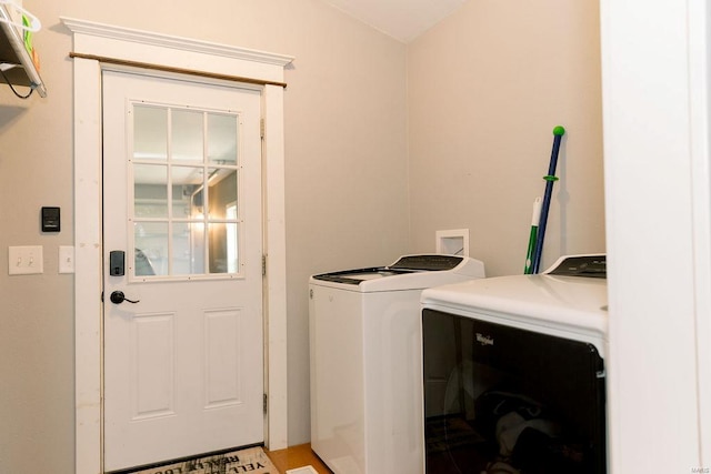 laundry room with washer and clothes dryer