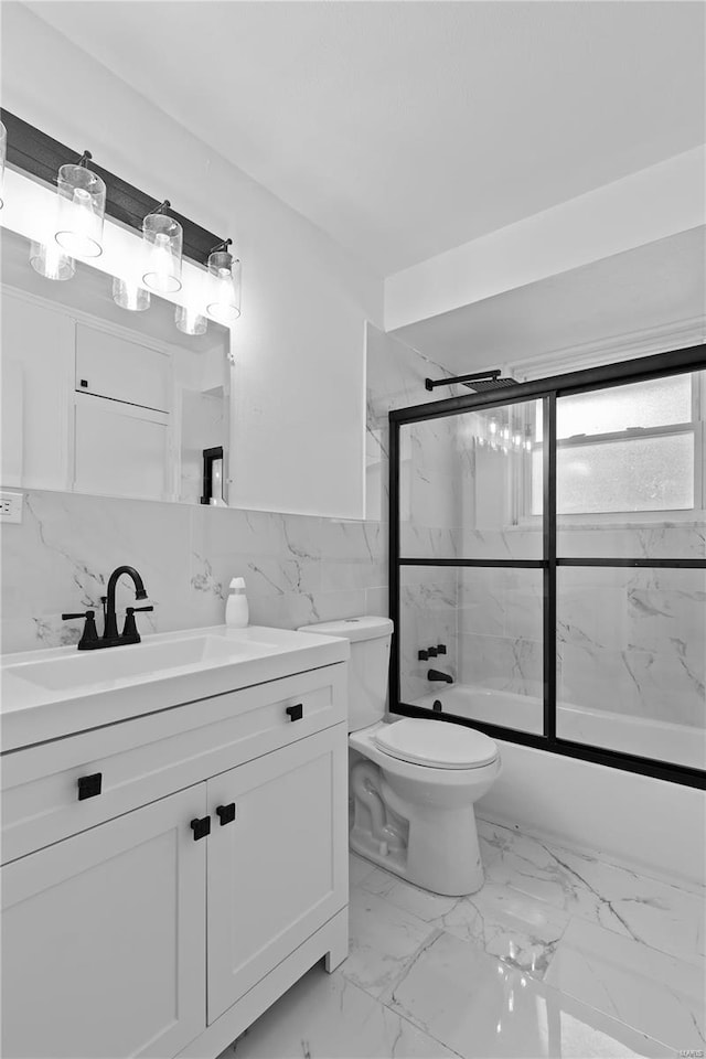 full bathroom with decorative backsplash, tile walls, combined bath / shower with glass door, toilet, and tile patterned flooring