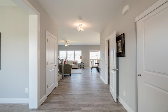 corridor featuring light wood-type flooring