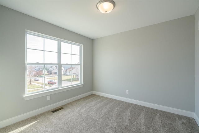 view of carpeted spare room