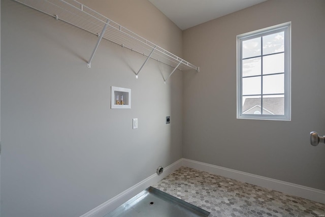 laundry room with tile patterned flooring, electric dryer hookup, and hookup for a washing machine