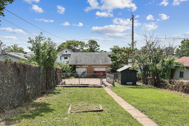 back of property with a storage shed and a yard