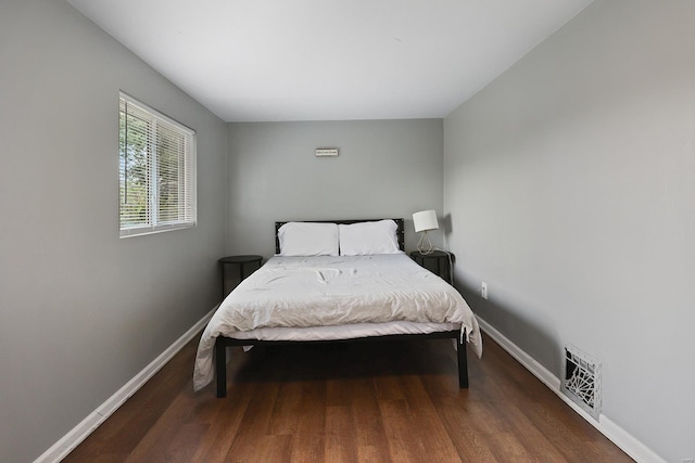 bedroom featuring wood-type flooring