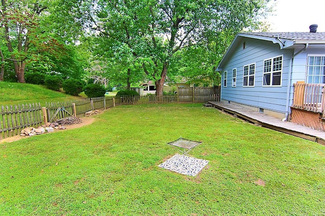 view of yard with a deck