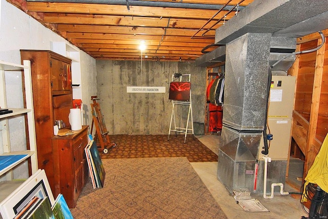 basement featuring heating unit