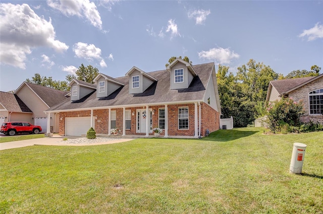 cape cod house with a front yard and a garage