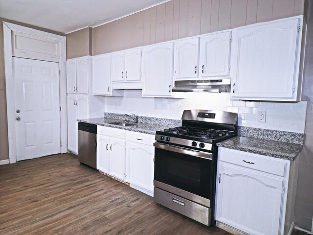 kitchen featuring white cabinetry, sink, stainless steel appliances, and dark wood-type flooring