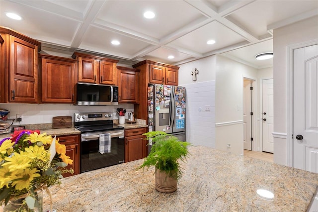 kitchen with stainless steel appliances, tasteful backsplash, coffered ceiling, and light stone counters