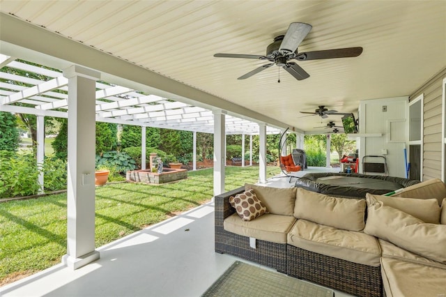 exterior space featuring an outdoor hangout area, ceiling fan, and a pergola