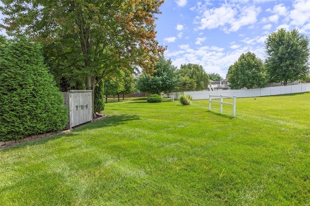 view of yard featuring fence