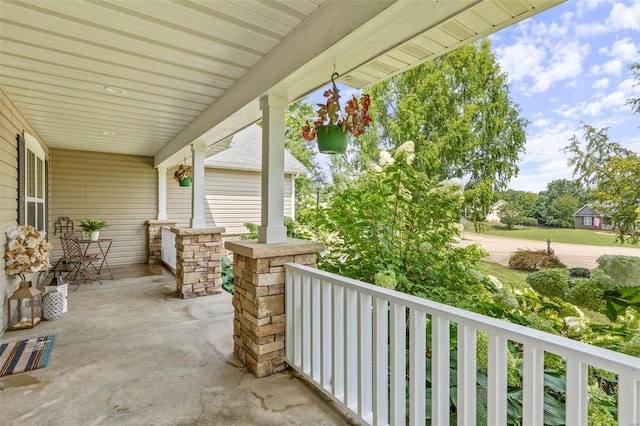 view of patio featuring a porch