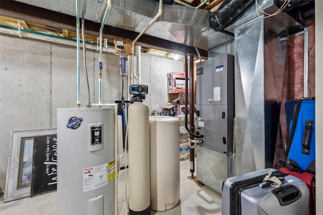 utility room featuring water heater