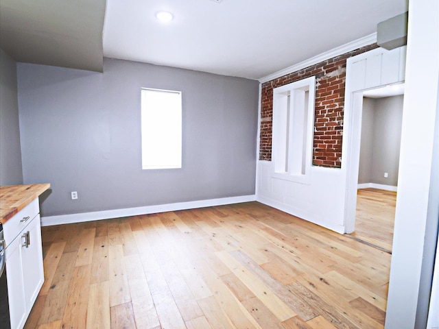 empty room with light wood-type flooring