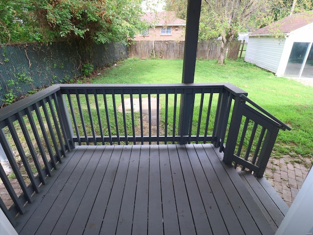 deck featuring a lawn