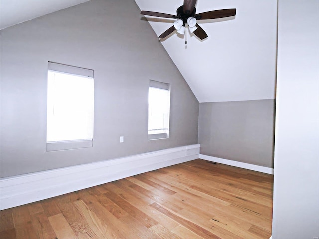 additional living space featuring ceiling fan, light hardwood / wood-style floors, and lofted ceiling