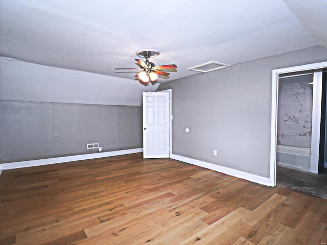 interior space featuring hardwood / wood-style flooring, vaulted ceiling, and ceiling fan