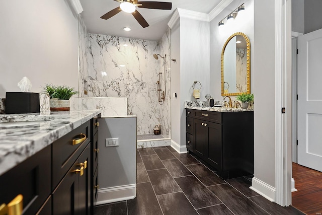 bathroom with crown molding, hardwood / wood-style floors, ceiling fan, walk in shower, and vanity