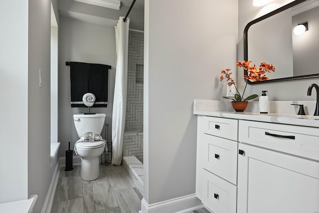 bathroom with tile patterned floors, vanity, a shower with shower curtain, and toilet