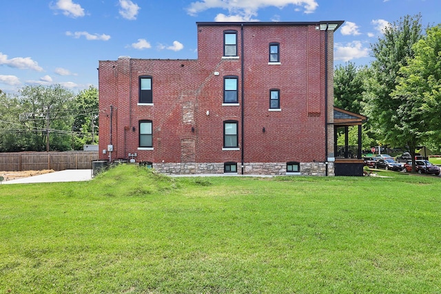 exterior space with a yard