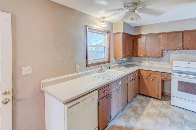 kitchen with ceiling fan, backsplash, light tile patterned floors, sink, and white appliances