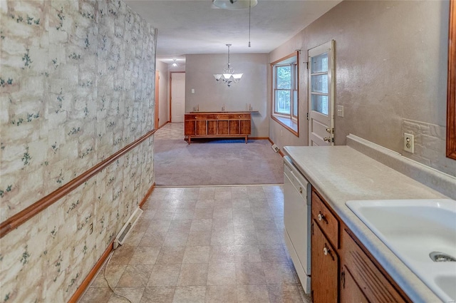 interior space with tile patterned flooring, an inviting chandelier, and vanity