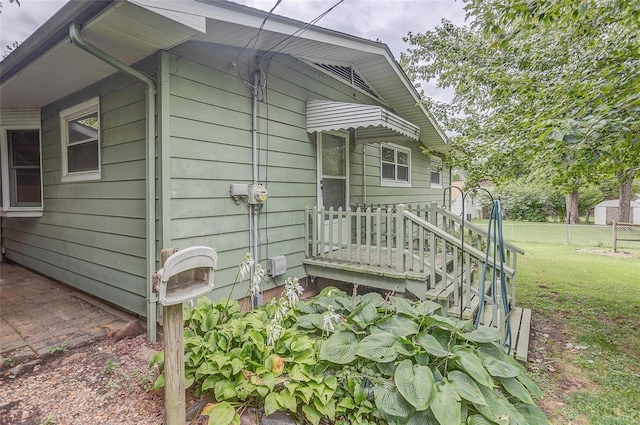 exterior space with a front lawn