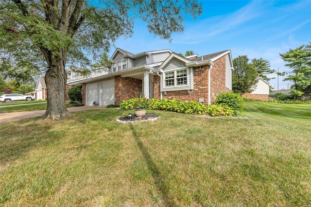 view of front of property with a front yard and a garage