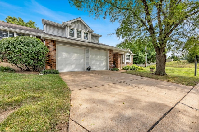 front facade featuring a garage and a front lawn