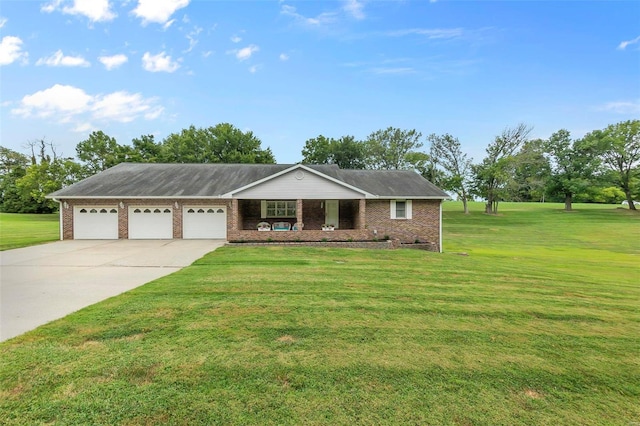 ranch-style house with an attached garage, a front lawn, concrete driveway, and brick siding