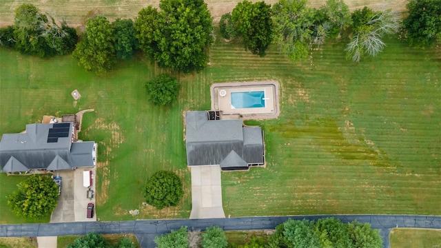 birds eye view of property with a rural view