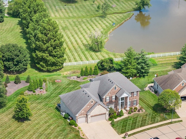 bird's eye view with a water view and a rural view