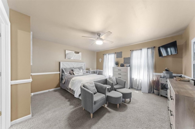 bedroom with ceiling fan and carpet floors