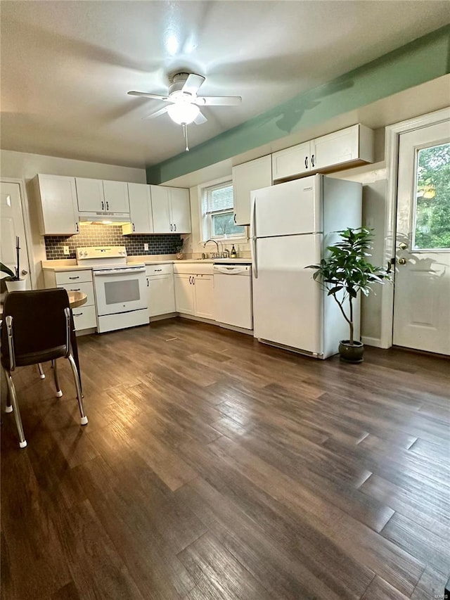 kitchen featuring ceiling fan, white cabinetry, dark hardwood / wood-style floors, and white appliances