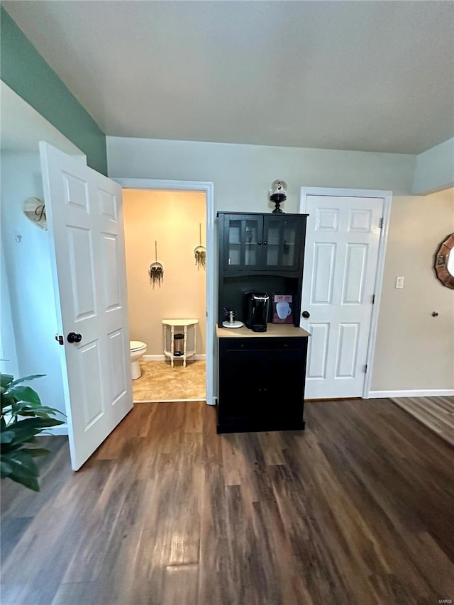 living room featuring dark wood-type flooring