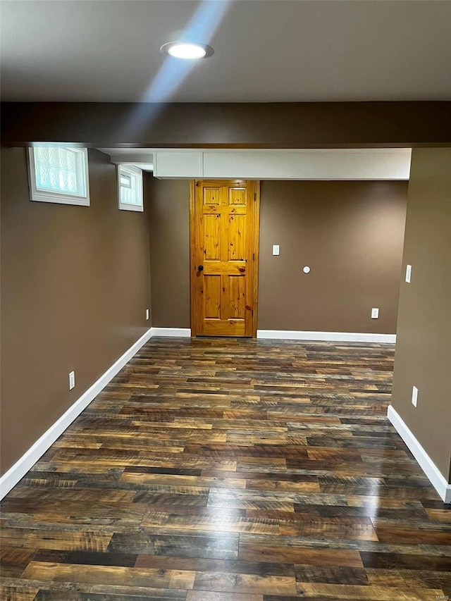 basement featuring hardwood / wood-style floors