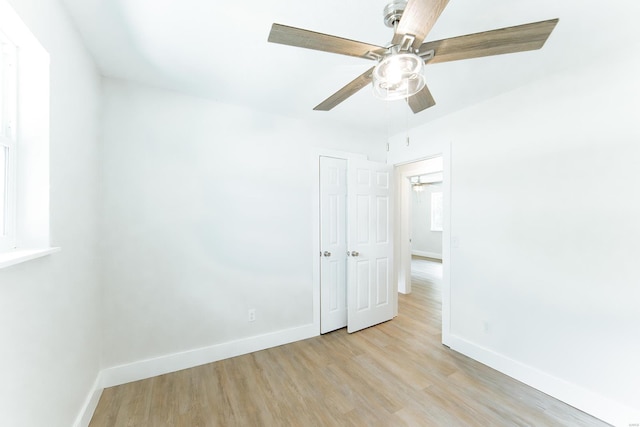 interior space with ceiling fan and light hardwood / wood-style flooring